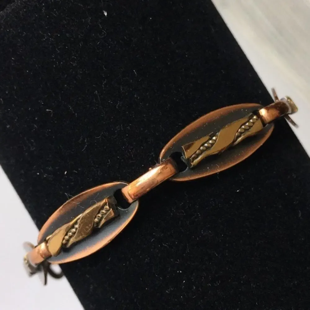 Copper tone abstract design link bracelet